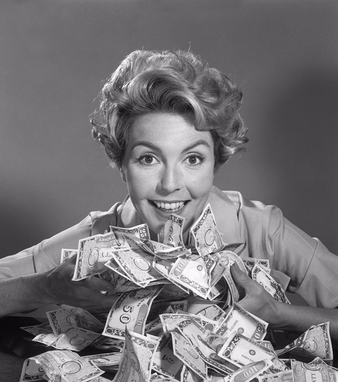 woman-with-money-c1950-60s-debrockeclassicstock