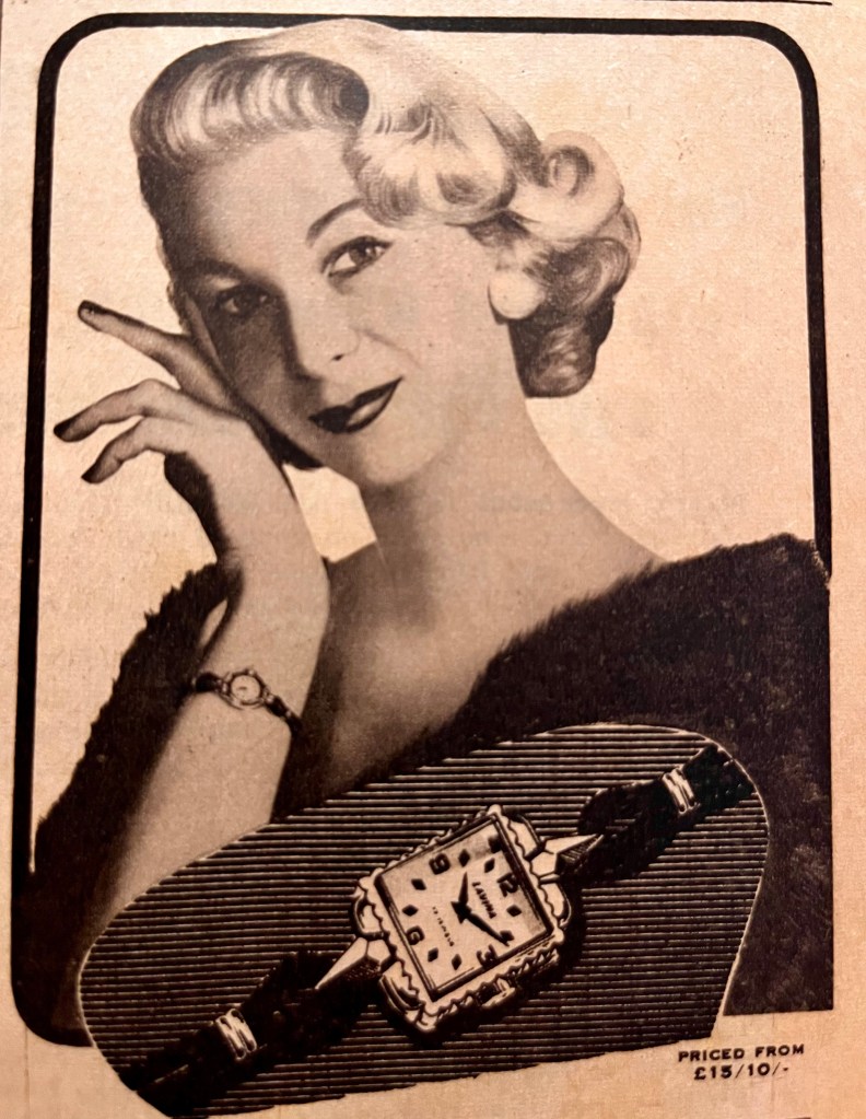 Glamorous woman showing off her watch - vintage

